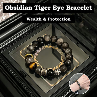 Obsidian beaded bracelet with gold tiger-eye accents and silver-tone spacers