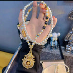 Diamantbesetzte, kürbisförmige Kunstperlenkette mit drehbarem Anhänger – elegante, vielseitige lange Strickkette im chinesischen Stil für Damen, inspiriert von einem tausend Jahre alten Tempel