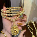 Diamantbesetzte, kürbisförmige Kunstperlenkette mit drehbarem Anhänger – elegante, vielseitige lange Strickkette im chinesischen Stil für Damen, inspiriert von einem tausend Jahre alten Tempel