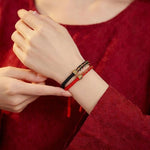 Om Mani Padme Hum Red & Black String Bracelets - Luck & Protection