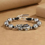 Handcrafted Feng Shui Wealth Talisman Bracelet with Pixiu Enamel 'Cai' Glyph for Attracting Abundance from a Thousand-Year-Old Temple